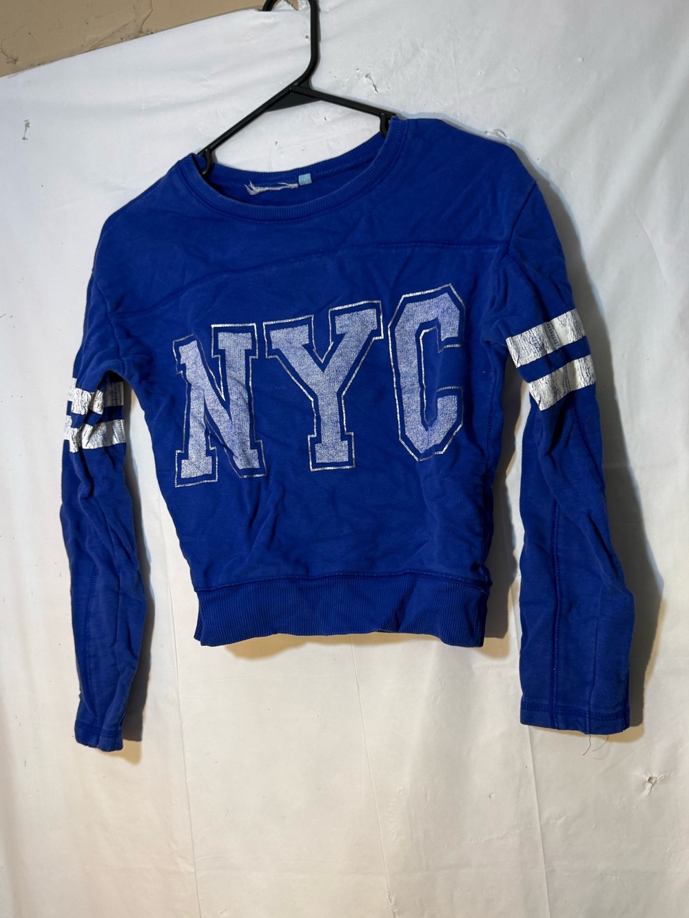 Royal blue Gap girls sweatshirt features large "NYC" size 12